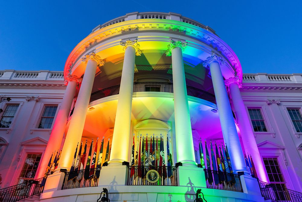 The South Portico is illuminated in Pride colors in honor of the signing of the Respect for Marriage Act Tuesday, December…