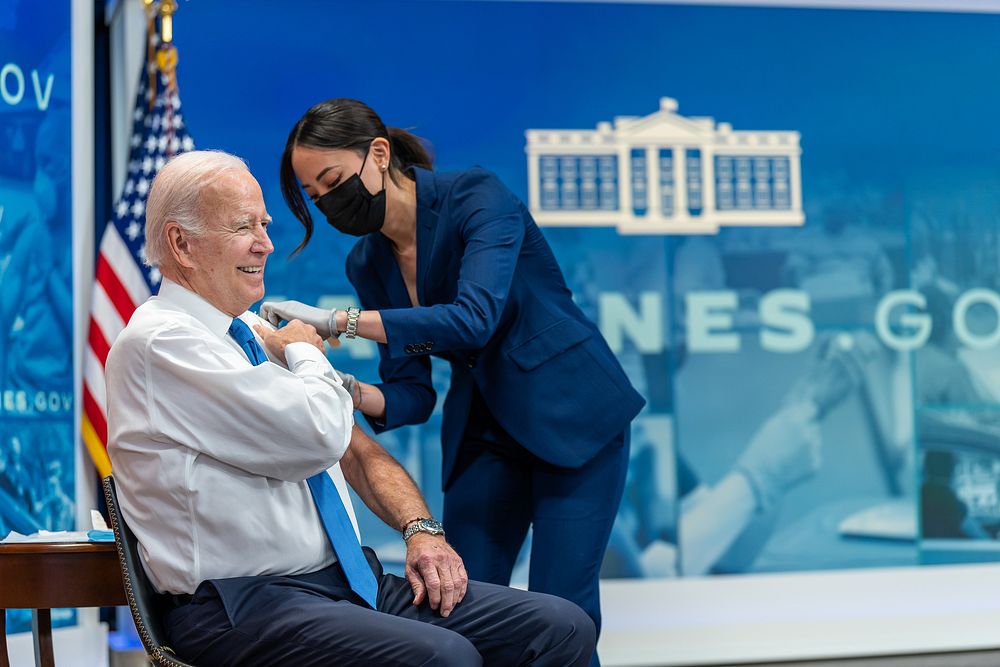 President Joe Biden receives the updated COVID-19 vaccine, Tuesday, October 25, 2022, in the South Court Auditorium of the…