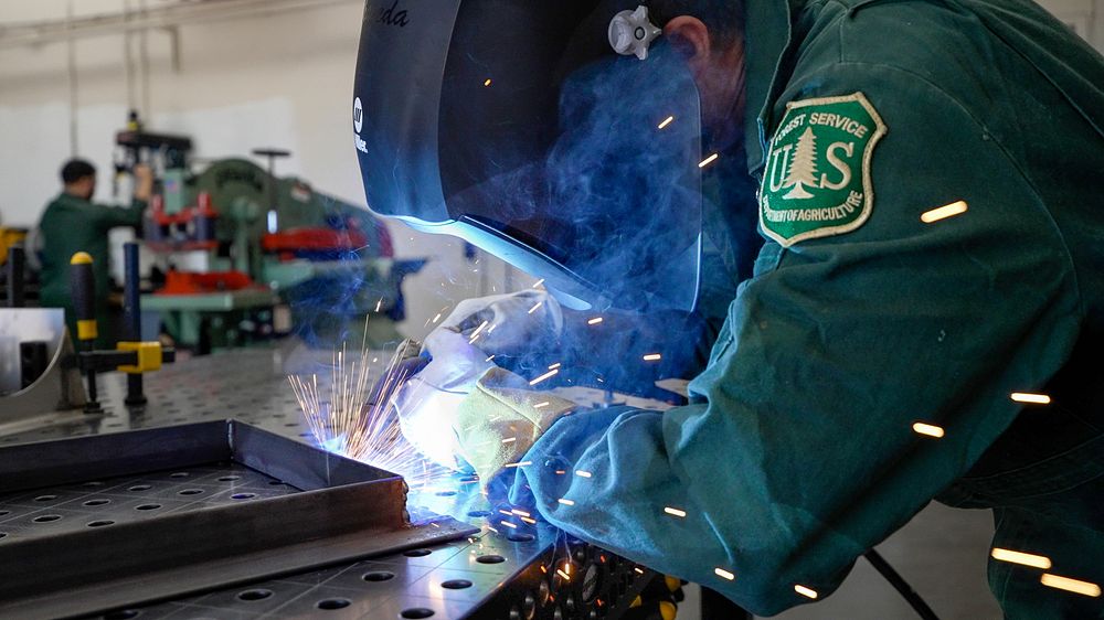 Equipment Specialist Scott Sakayeda in the shop at the National Technology and Development Program (NTDP), in San Dimas…