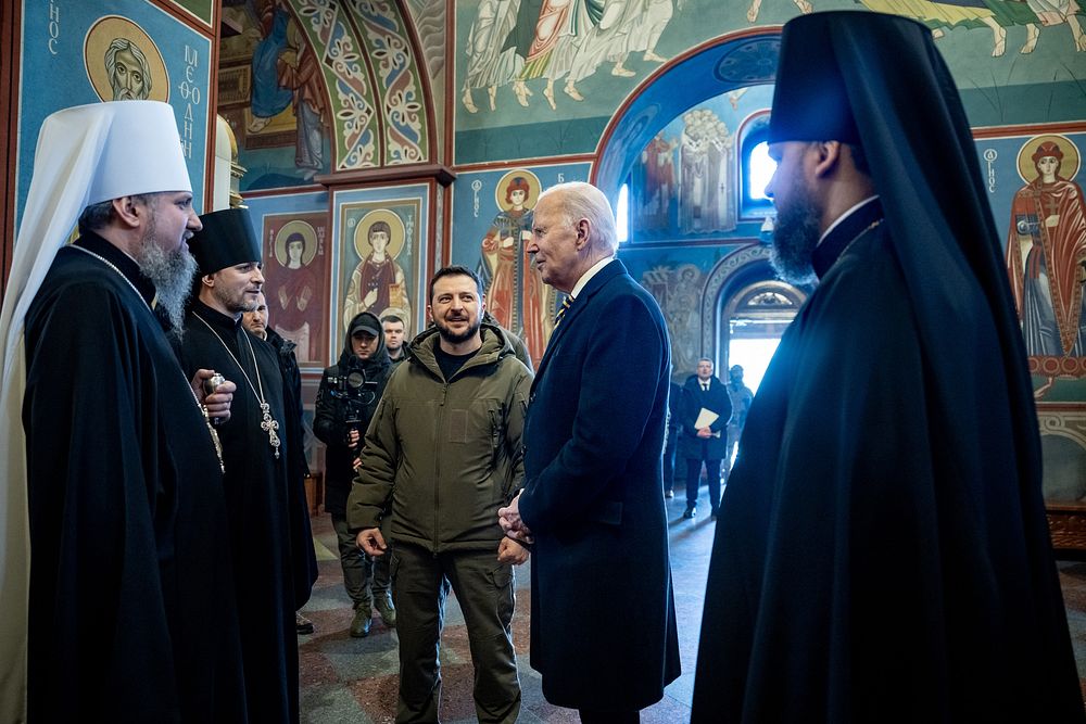 President Joe Biden walks with Ukrainian President Volodymyr Zelenskyy at St. Michael’s Cathedral, Monday, February 20…