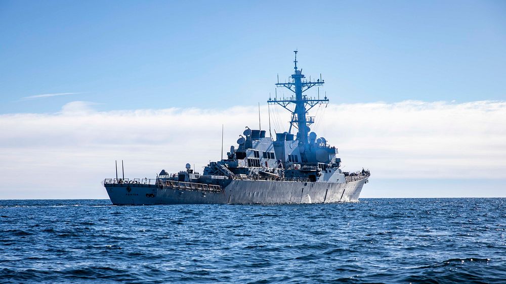 The Arleigh Burke-class guided-missile destroyer USS Porter (DDG 78) steams alongside the Swedish Navy first-in-its-class…