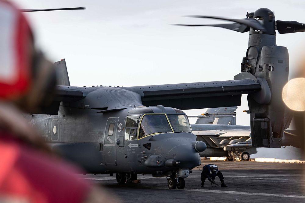 CV-22B DLQ with CVN 77A U.S. Air Force CV-22B Osprey with the 352nd Special Operations Wing, is chained to the flight deck…