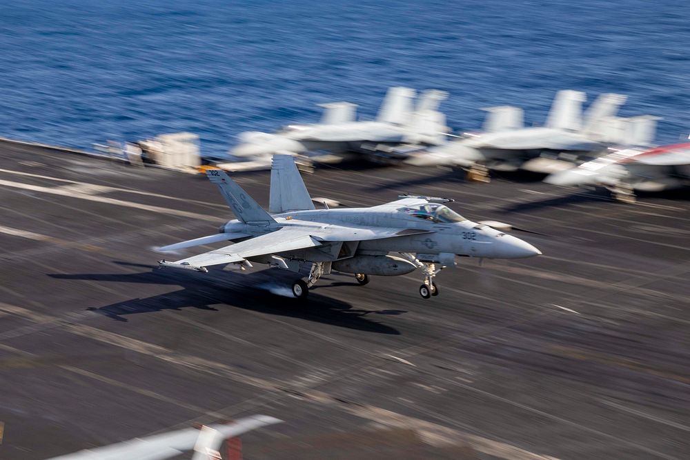 MEDITERRANEAN SEA (Jan. 27, 2023) An F/A-18E Super Hornet aircraft, attached to Strike Fighter Squadron (VFA) 86, lands on…