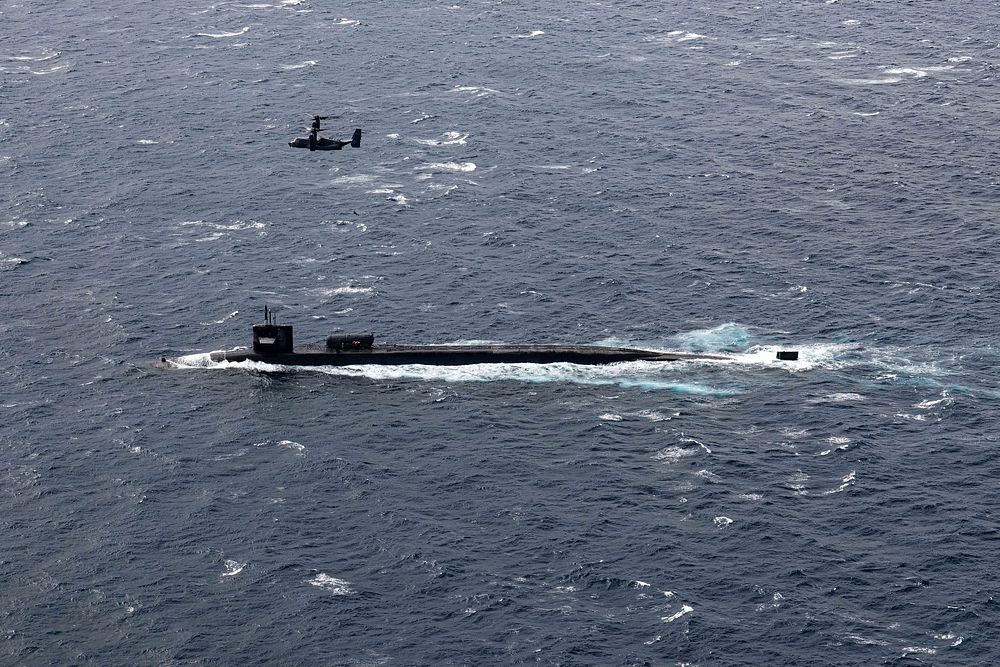 MEDITERRANEAN SEA (Feb. 26, 2023) Ohio-class guided-missile submarine USS Florida (SSGN 728) and a CV-22 Osprey, assigned to…