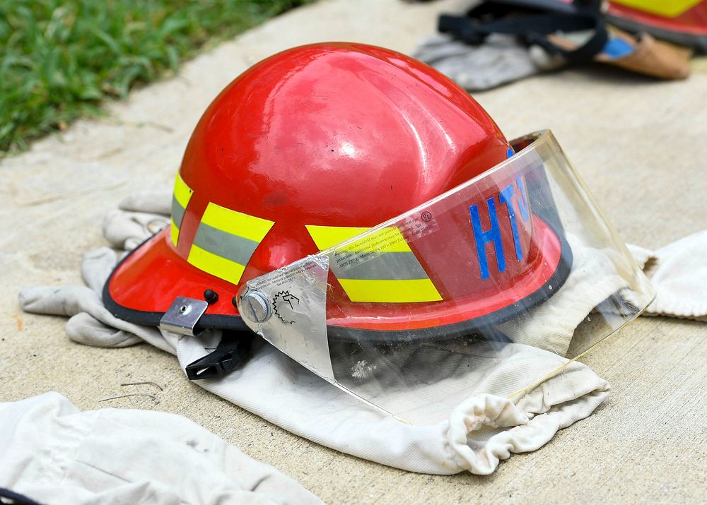 Red hard hat, firefighter protective gears.