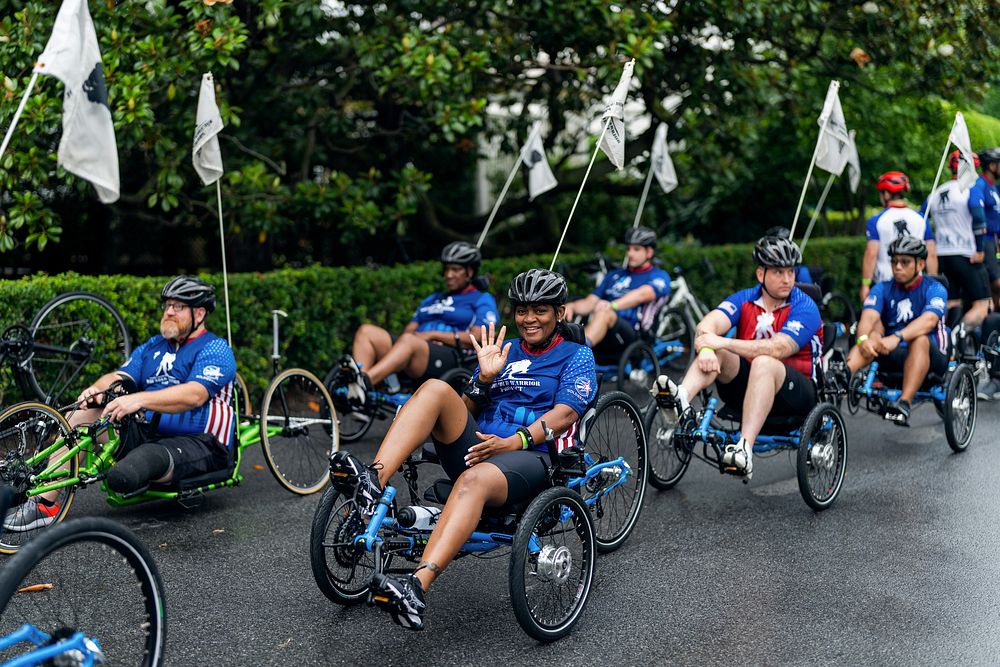 Cyclists with the Wounded Warrior Project Soldier Ride circle the South Lawn, Thursday, June 23, 2022, at the White House.…