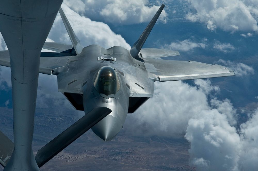 A U.S. Air Force F-22 Raptor aircraft with the 49th Fighter Wing, Holloman Air Force Base, N.M., pulls up for air refueling…