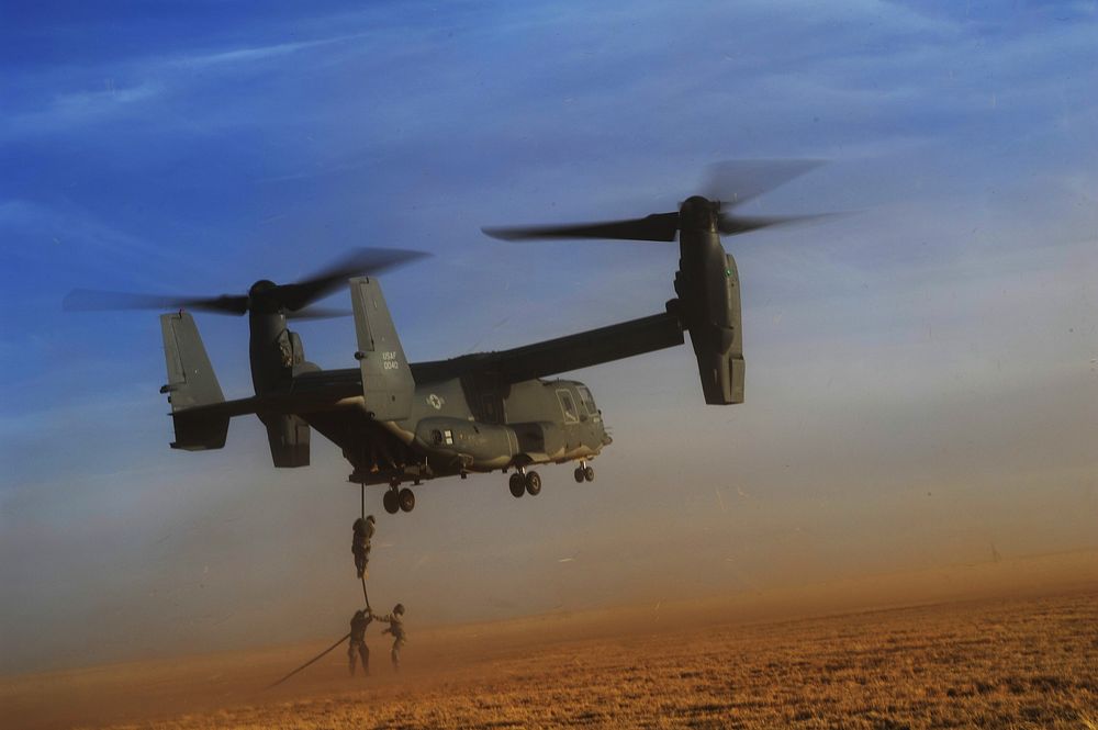 U.S. Soldiers with Alpha Company, 4th Battalion, 10th Special Forces Group fast-rope from a CV-22 Osprey tiltrotor aircraft…