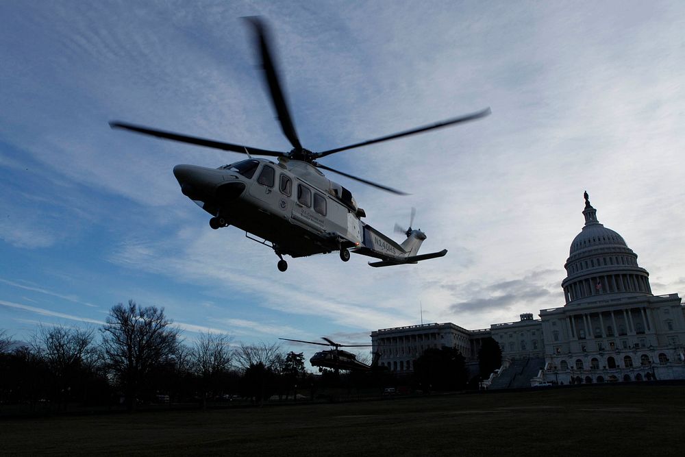 CBP helicopters land on the Capital during an exercise that provides increased security. Photo by James Tourtellotte.…