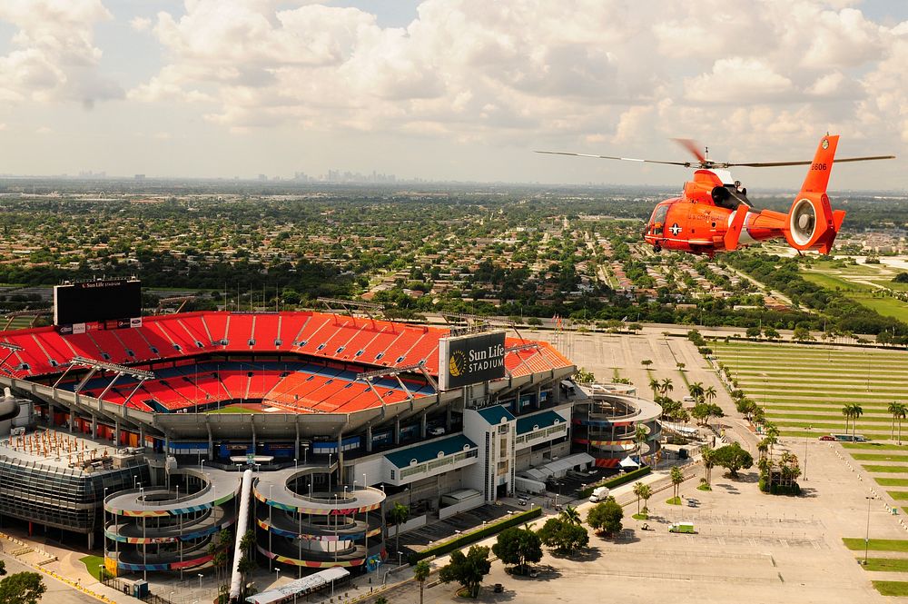 MIAMI - A Coast Guard Air Station Miami MH-65 Dolphin helicopter crew conducts a practice fly over of Sun Life Stadium Aug.…