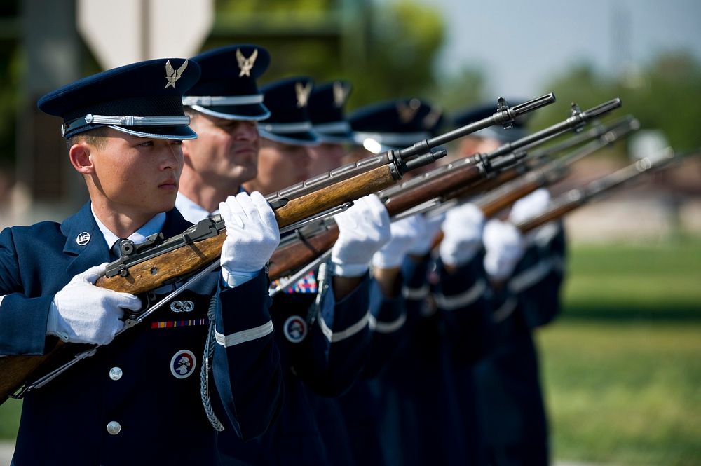 U.S. Air Force Nellis Honor Guard firing party performs a 21-gun salute during the National Prisoner of War/Missing in…