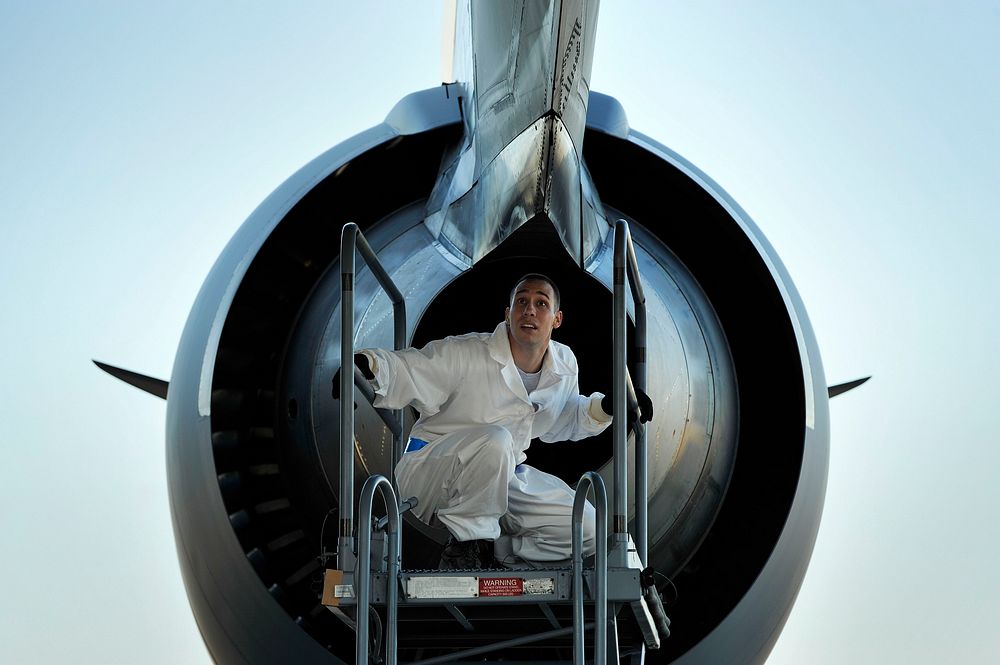 A U.S. Air Force C-17 Globemaster III maintainer inspects the aircraft's engines during an Operational Readiness Evaluation…
