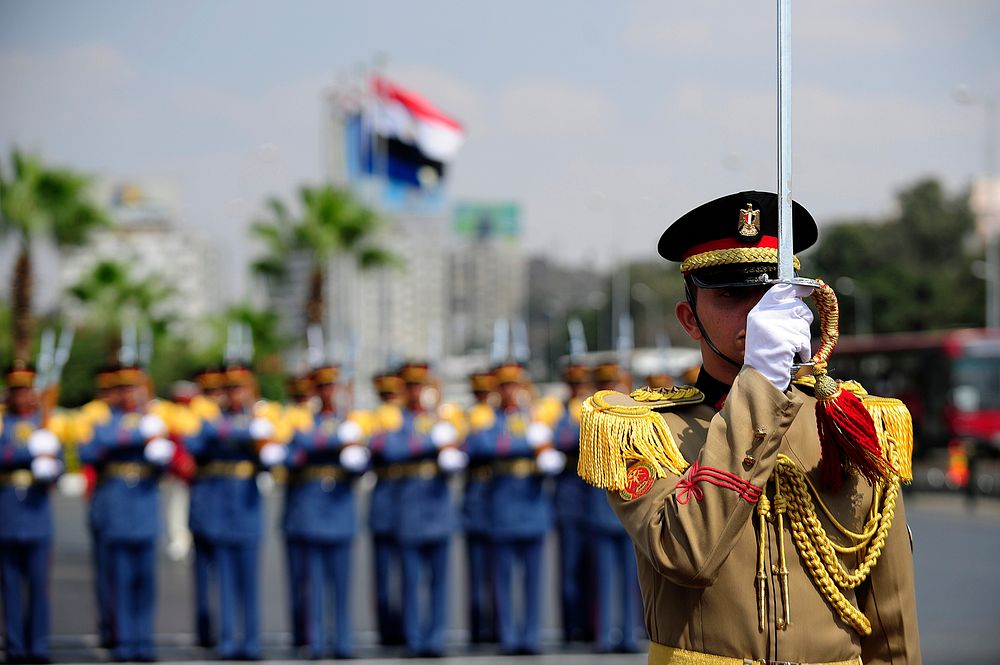Egyptian soldiers stand at attention during a wreath-laying ceremony attended by U.S. Secretary of Defense Leon Panetta at…