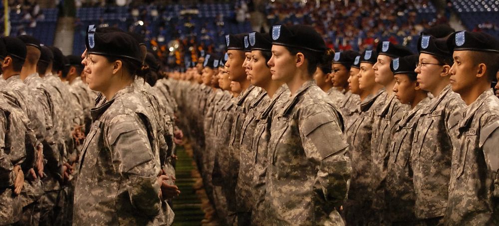New U.S. Soldiers take the oath of enlistment during the opening ceremonies at the U.S. Army All American Bowl in the…