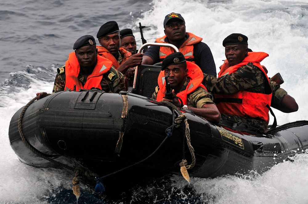 Cameroon sailors approach the guided missile frigate USS Simpson (FFG 56) in a rigid hull inflatable boat during a visit…