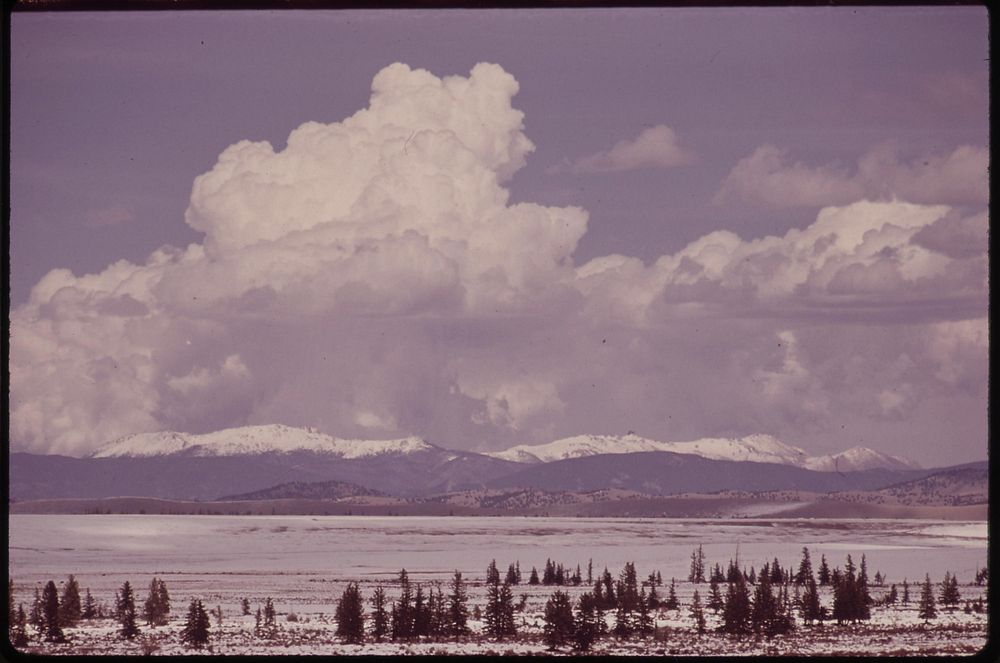Thunderclouds over grassy plateau, 05/1972. Photographer: Norton, Boyd. Original public domain image from Flickr