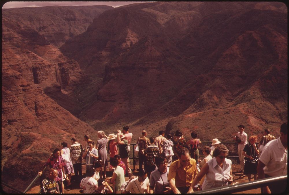 Tourists view Waimea Canyon, October 1973. Photographer: O'Rear, Charles. Original public domain image from Flickr