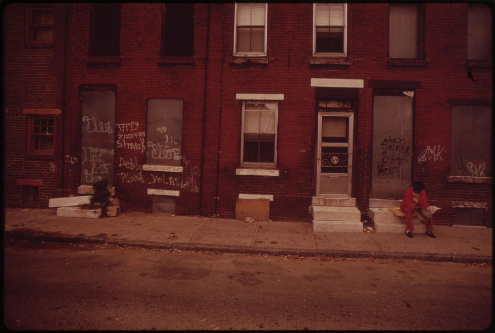 Two Men Sit Silently On Stoops Of Abandoned North Philadelphia Houses, August 1973. Photographer: Swanson, Dick. Original…