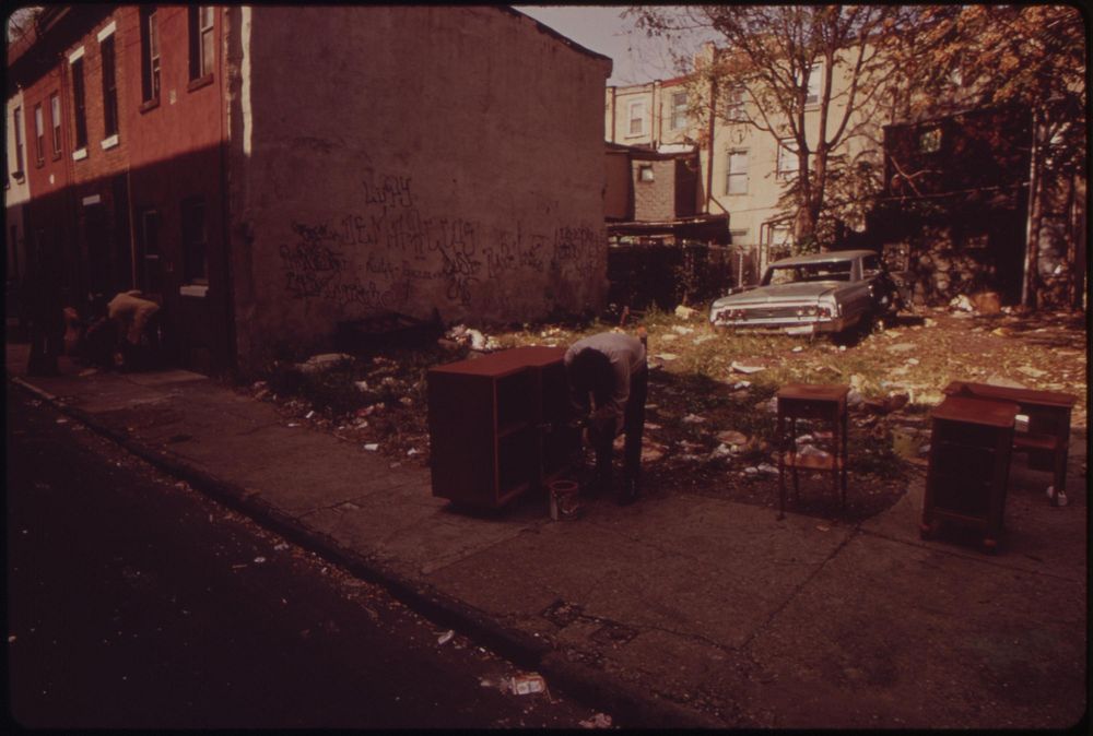Abandoned Car In Trash-Strewn Lot, August 1973. Photographer: Swanson, Dick. Original public domain image from Flickr
