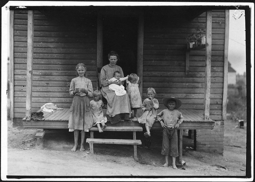 Family of Mrs. Wm. Fuqua. On account of slack work in the cotton mill, her husband recently got work up-town, June 1911.…