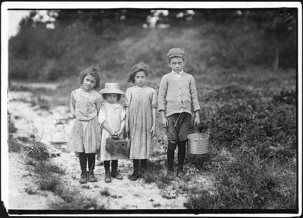Three pickers going home from work. Anne, 7 years old, and brother Vincent said 11, September 1911. Photographer: Hine…