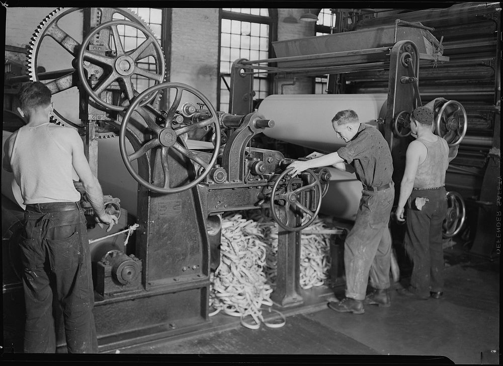 Mt. Holyoke, Massachusetts - Paper. American Writing Paper Co. Rewinding paper from reel, 1936. Photographer: Hine, Lewis.…