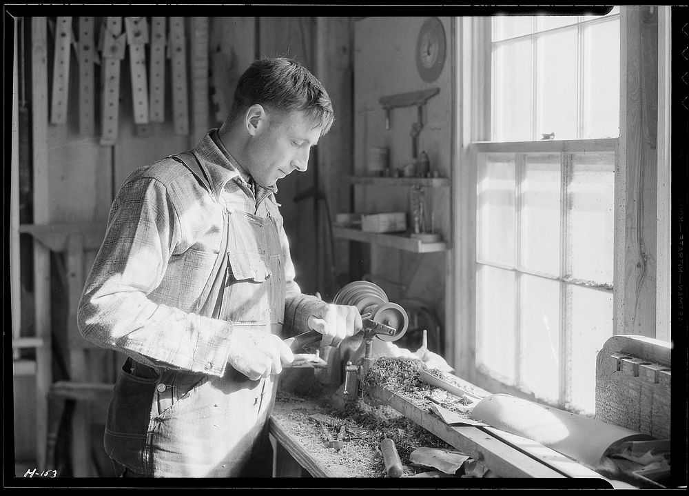A close-up of one of the men in the shop of the Woodcrafters and Carvers, Gatlinburg, Tennessee, November 1933.…