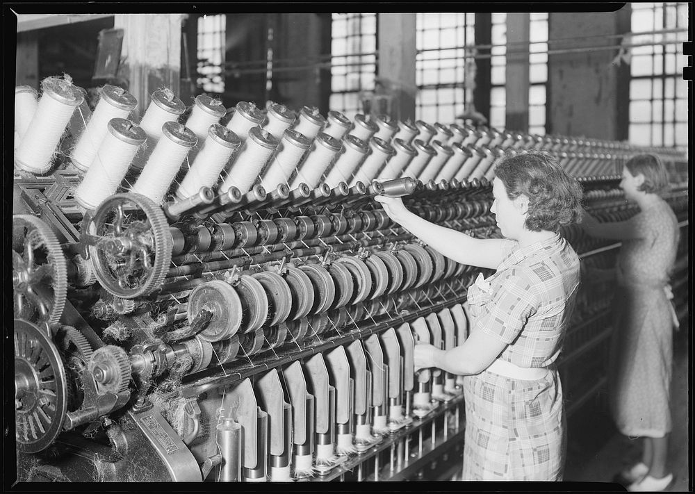 Two women working with machines, March 1937. Photographer: Hine, Lewis. Original public domain image from Flickr