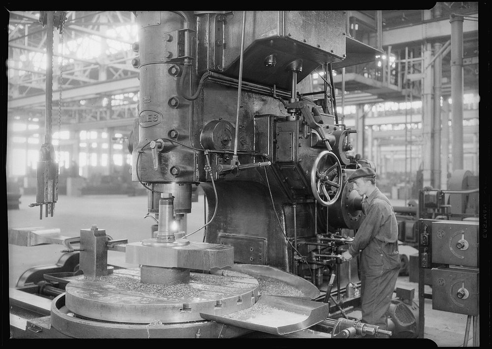 Railroad parts. Baldwin Locomotive Works. Man working at machine, May 1937. Photographer: Hine, Lewis. Original public…