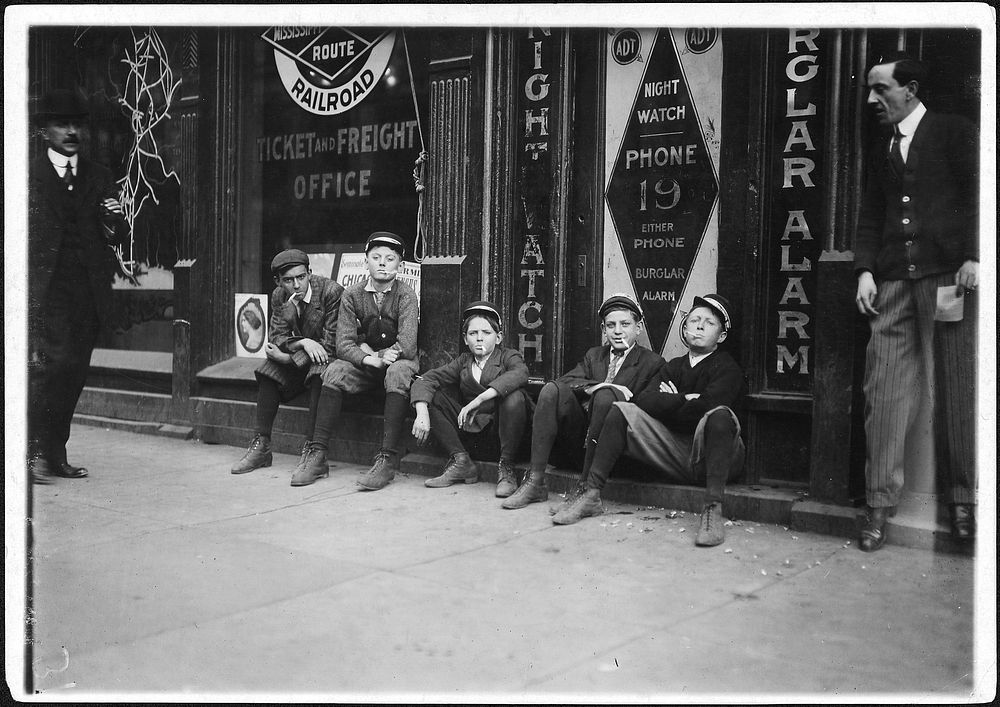 A.D.T. Boys. They all smoke. Birmingham, Ala, November 1910. Photographer: Hine, Lewis. Original public domain image from…