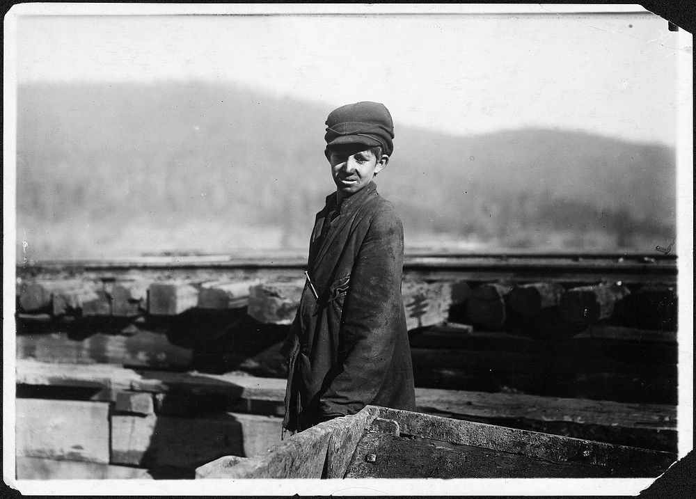 Harley Bruce, a young coupling-boy at tipple of Indian Mine, December 1910. Photographer: Hine, Lewis. Original public…
