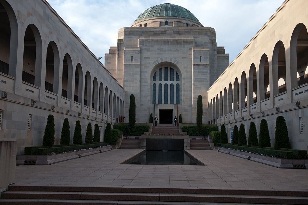Australian service members conduct a changing of the guard at the Australian War Memorial in Canberra, Australia, July 18…