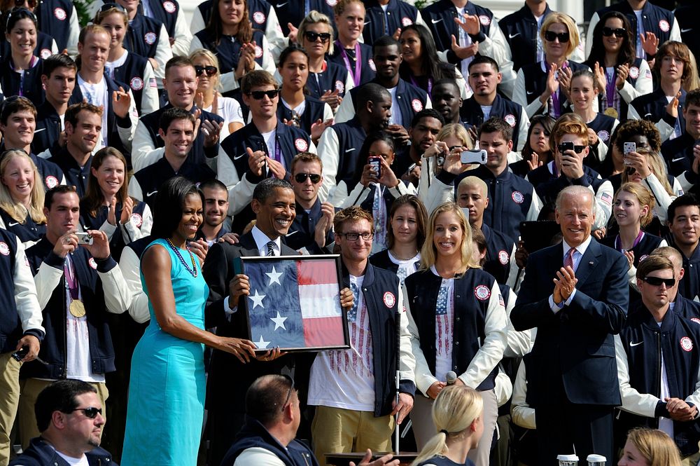 From left to right, first lady Michelle Obama, President Barack Obama, Paralympic swimmer Brad Snyder, Olympic fencer Mariel…