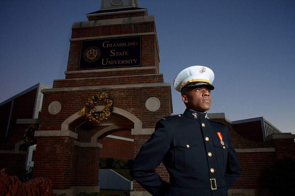 U.S. Marine Corps 2nd Lt. Olaolu Ogunyemi wears the dress blue uniform for the first time in front of his alma mater…