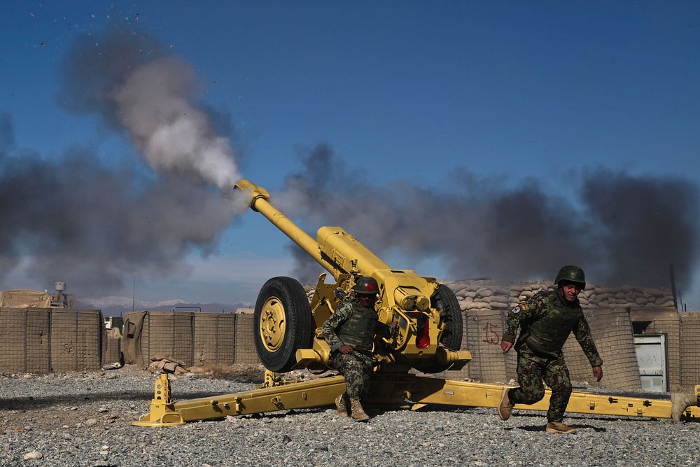 Afghan National Army soldiers fire a D30 122 mm howitzer during a demonstration in Logar province, Afghanistan, Dec. 4, 2012.