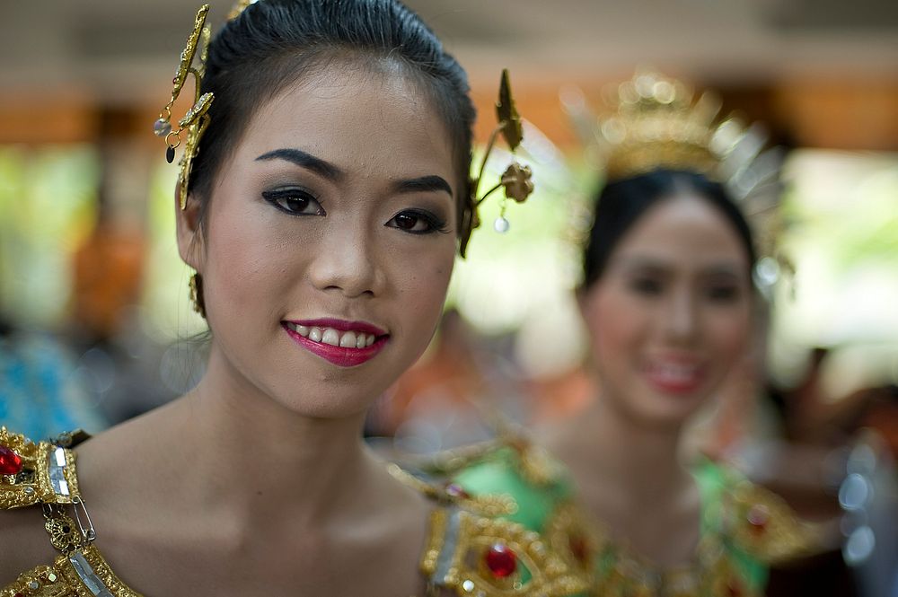Performers greet U.S., Thai and Singaporean airmen during a Thai cultural performance at Korat Pittyakom School during Cope…