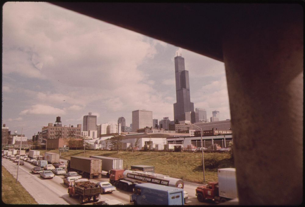 Heavy Traffic On The Dan Ryan Expressway In Chicago Illinois. The Tall Building In The Background Is The Sears Tower, 110…