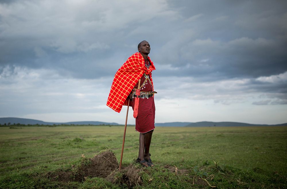 Josphat Mako, Maasai guide and companion to author and travel writer Stuart Butler stands in the Mara North Conservancy…