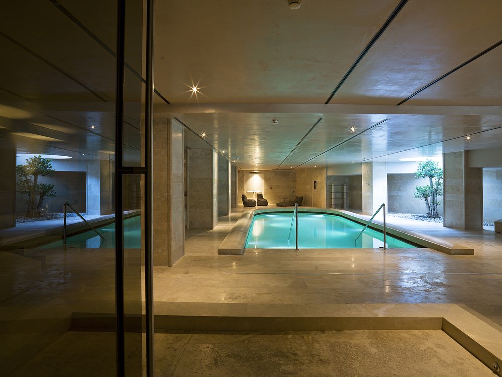 Indoor swimming pool at A.Roma Lifestyle Hotel