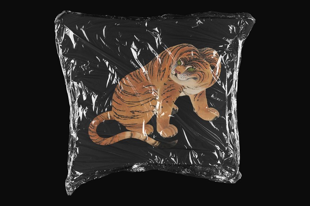 Japanese tiger, plastic wrap isolated on black design. Remixed by rawpixel.
