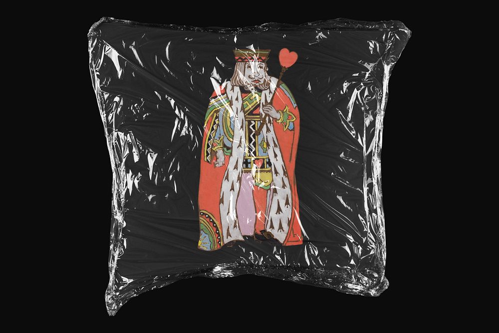 King of Hearts, Lewis Carroll&rsquo;s Alice&rsquo;s Adventures in Wonderland character in plastic wrap isolated on black…