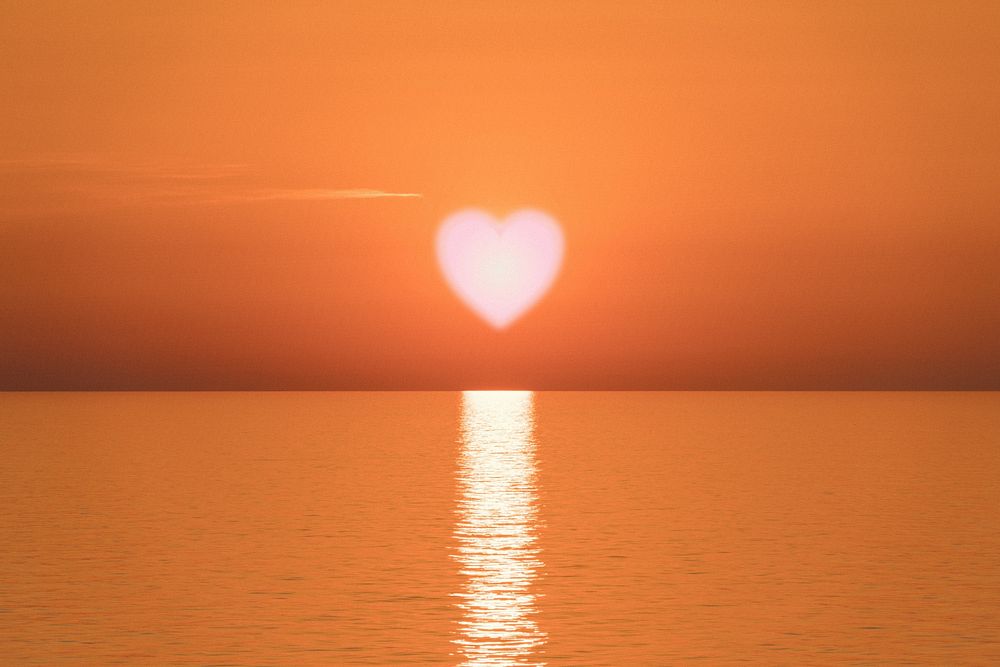 Heart sunset background, ocean design