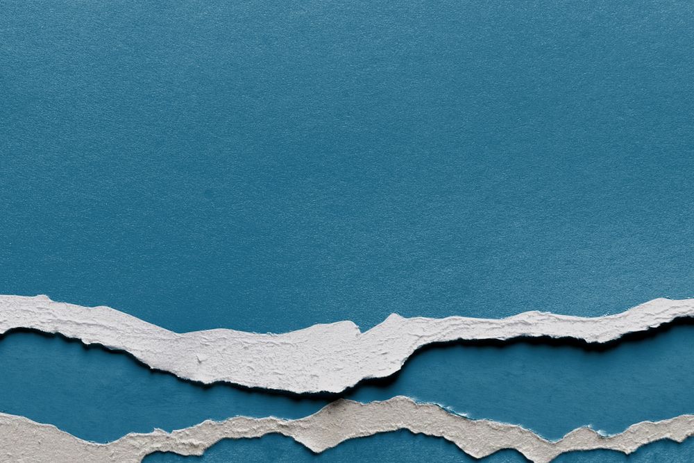 Blue ripped paper textured background