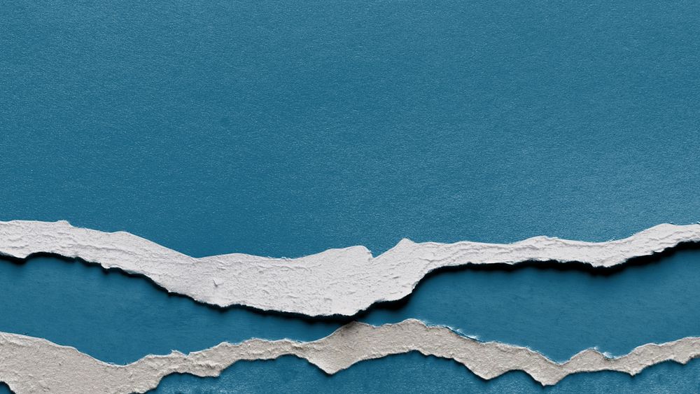 Ripped blue paper desktop wallpaper