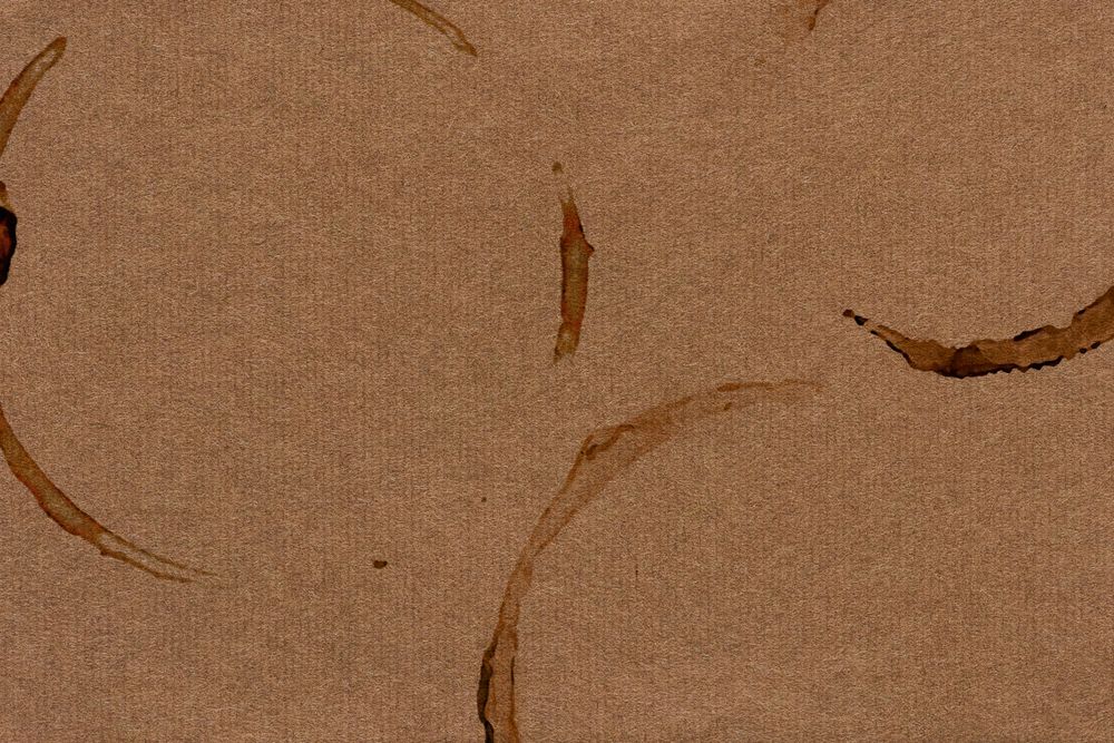 Coffee cup stain background, brown paper
