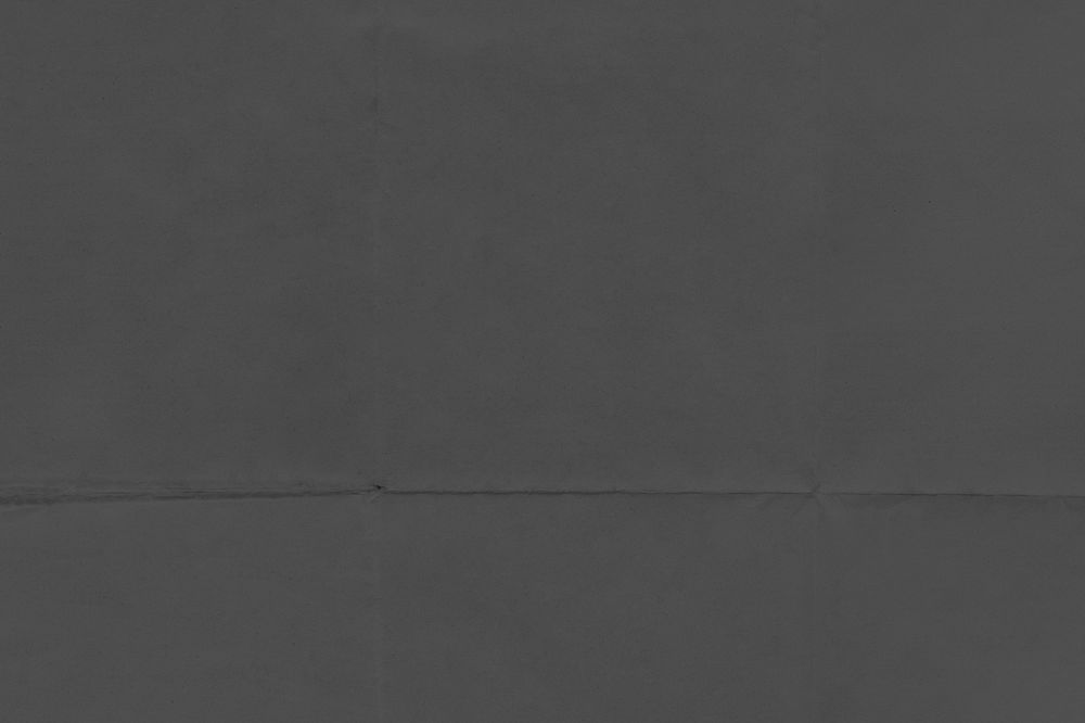 Off-white wrinkled paper background, folded textured design