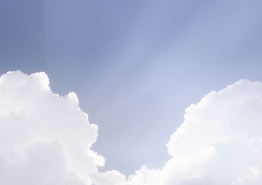 Beautiful cloudy sky background with sun ray