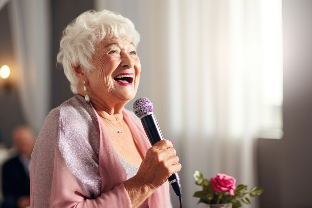 Chubby Senior woman speaker microphone laughing smiling. AI generated Image by rawpixel.