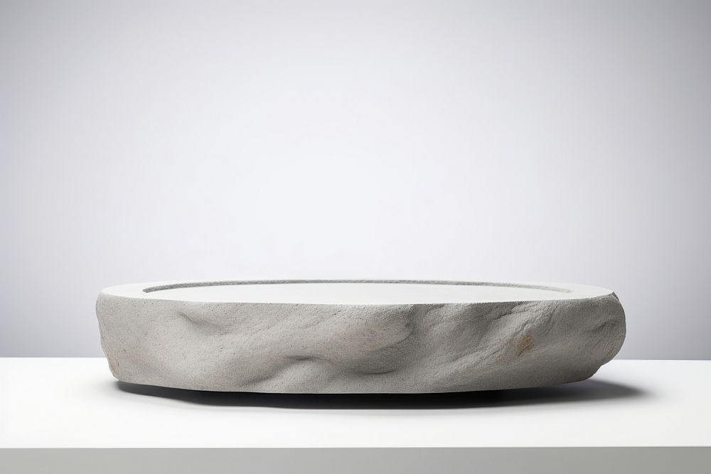 Circle gray rock podium stand simplicity porcelain dishware. AI generated Image by rawpixel.