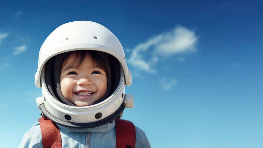 Astronaut smiling helmet child. AI generated Image by rawpixel.